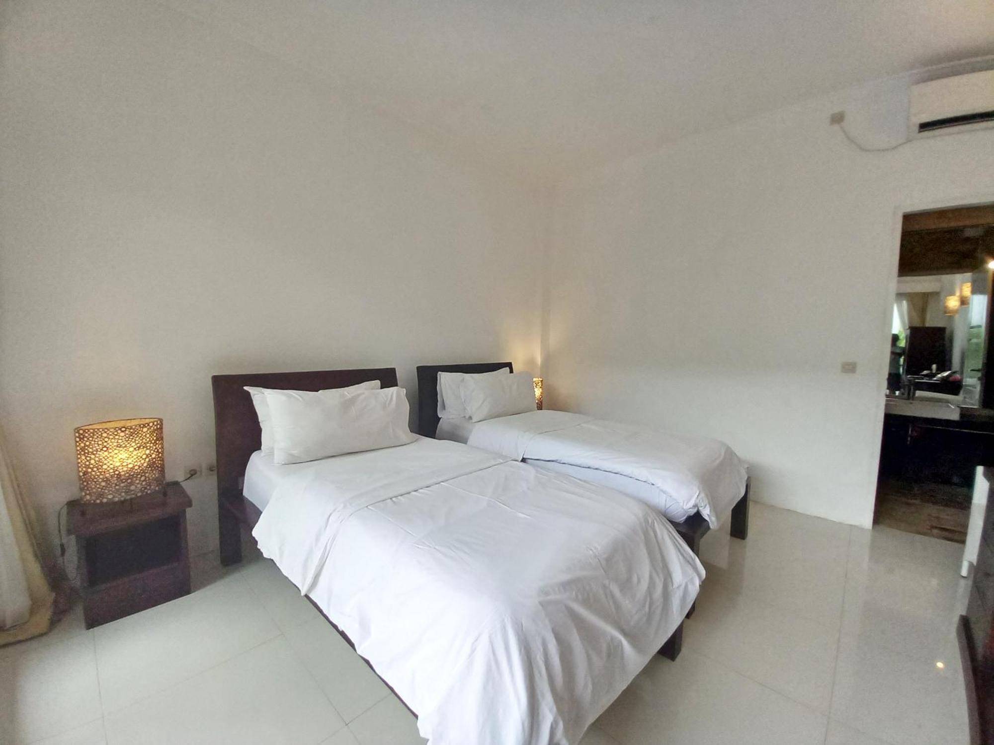 Lumiere Hotel Quần đảo Gili Phòng bức ảnh